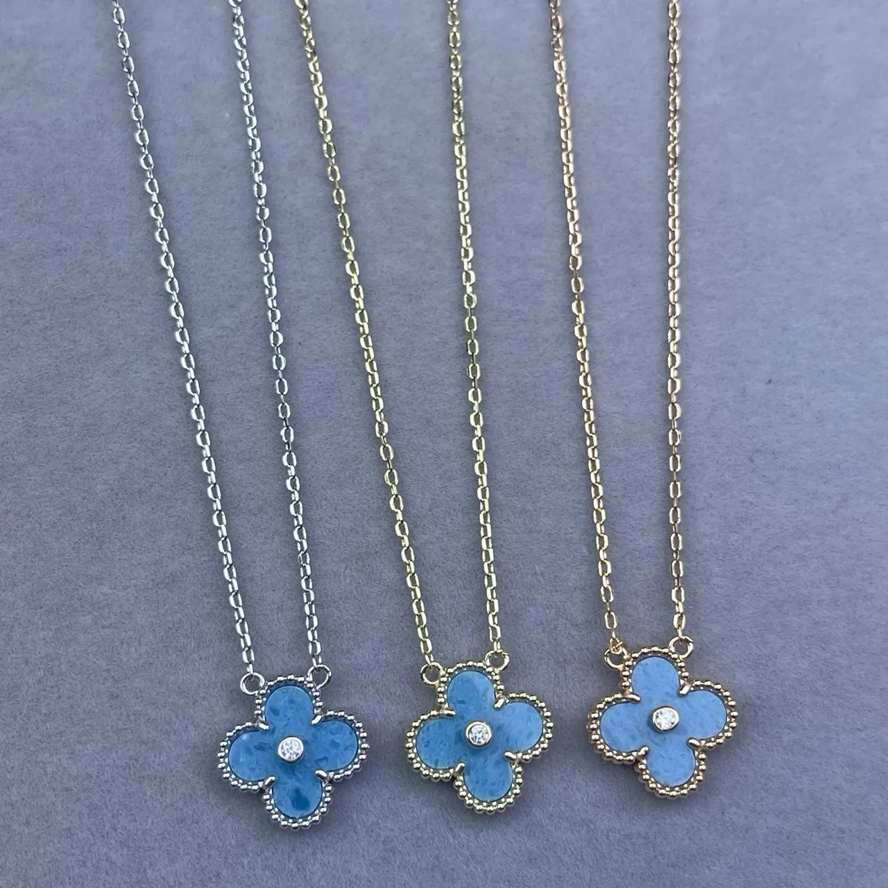 Blue Enamel Four-Petal Flower Pendant Necklace