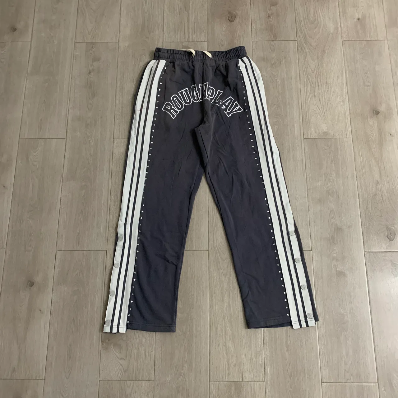 Roughplay Arch Logo Studded Stripe Sweatpants