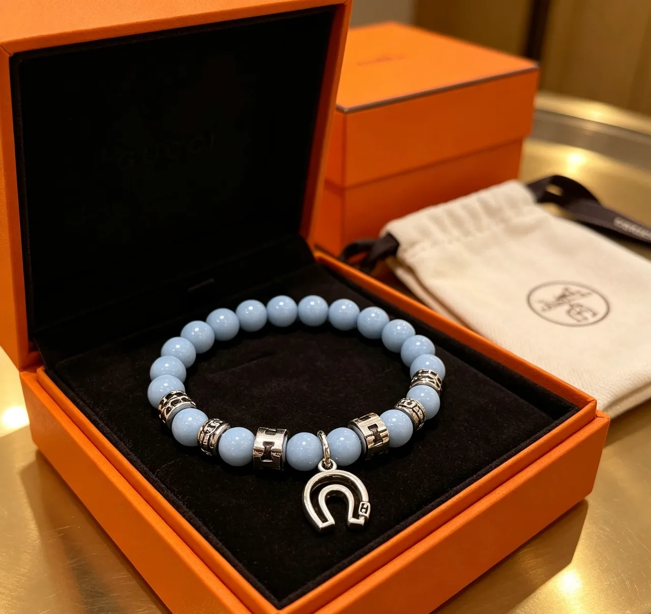 Gucci Beaded Light Blue Stone and Silver-Tone Horseshoe Charm Bracelet