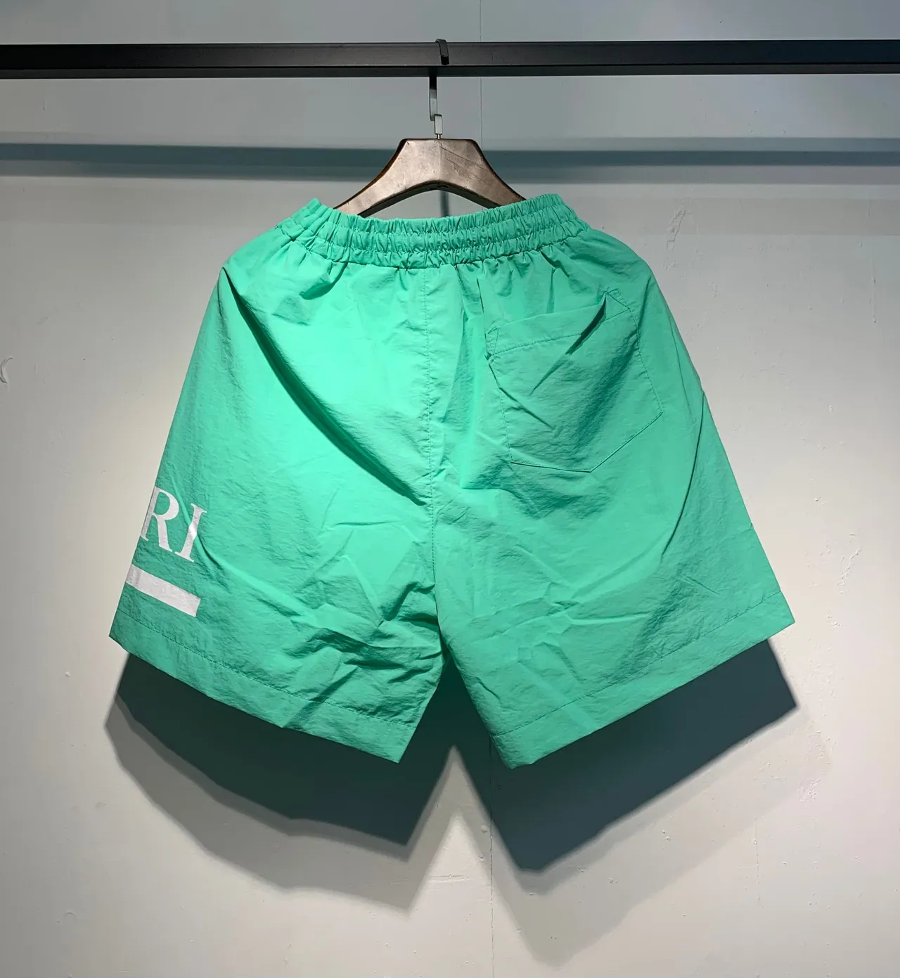 AMI Paris Black Green Lightweight Synthetic Fabric Side Logo Print Shorts