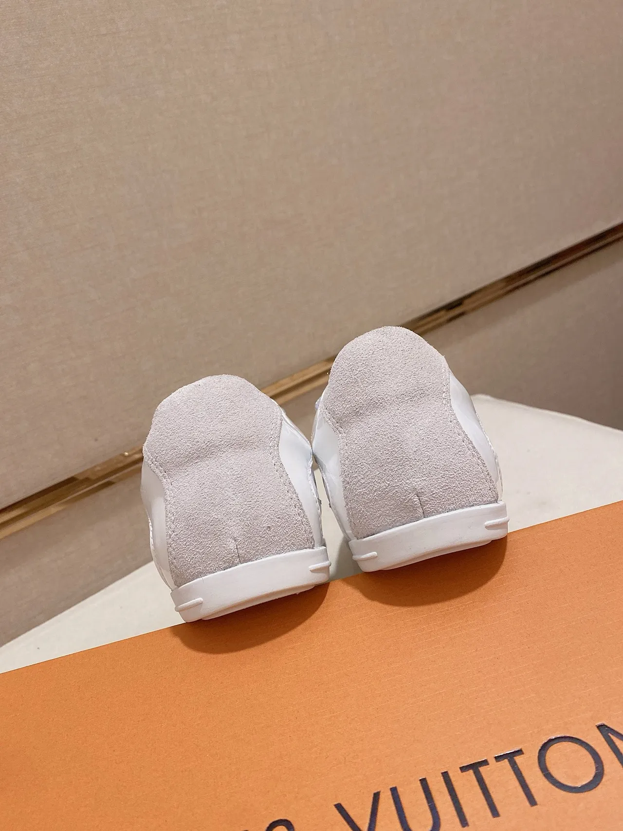 Louis Vuitton LV Trainer White Gold Monogram-Embossed Leather Suede Toe Cap Lifestyle Sneakers