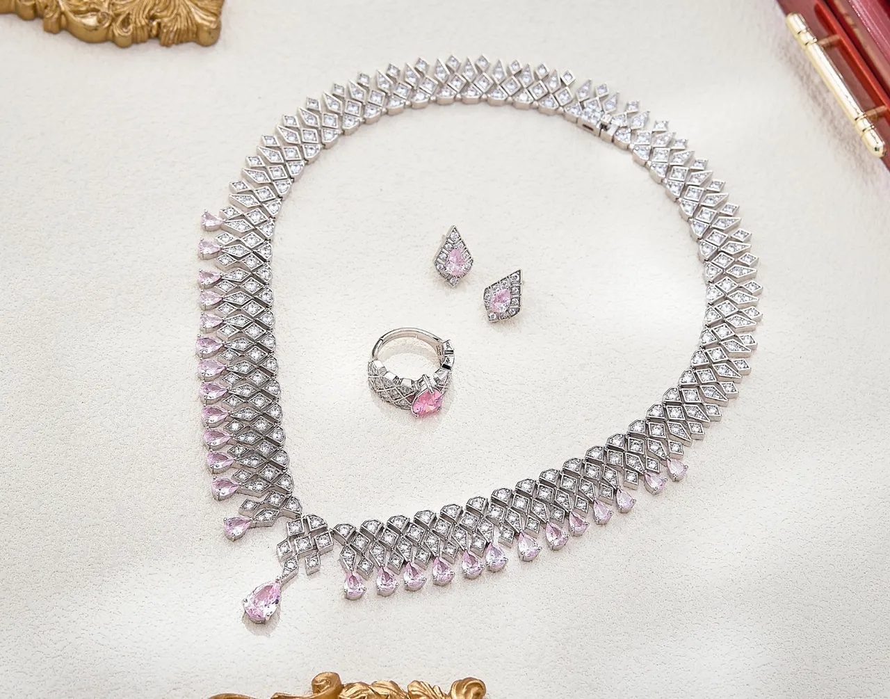 Pear-Shaped Pink Gemstone Geometric Halo Stud Earrings