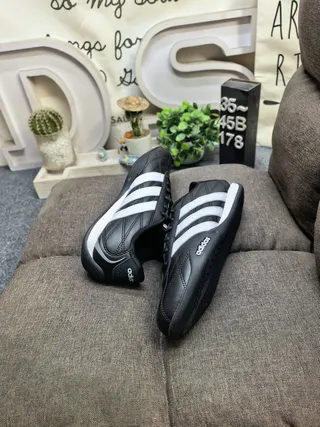 Adidas Black and White Three-Stripe Leather Low-Top Lifestyle Sneakers