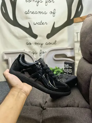Maison Margiela Black Glossy Patent Leather Stitched Panel Construction Lifestyle Sneakers
