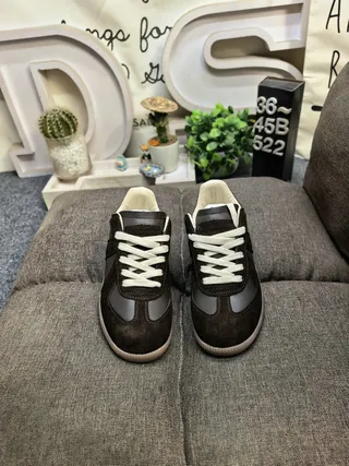Maison Margiela Black Glossy Patent Leather Stitched Panel Construction Lifestyle Sneakers
