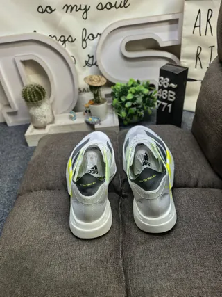 Adidas White Yellow Lightweight Mesh Upper Sculpted Lightstrike Pro Midsole Running Shoes
