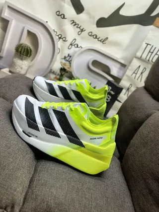 Adidas Yellow Black Asymmetrical Heel Cage Perforated Three-Stripe Design Running Shoes