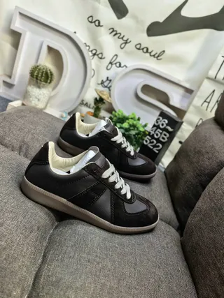 Maison Margiela Black Glossy Patent Leather Stitched Panel Construction Lifestyle Sneakers