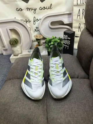 Adidas White Yellow Lightweight Mesh Upper Sculpted Lightstrike Pro Midsole Running Shoes