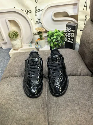 Maison Margiela Black Glossy Patent Leather Stitched Panel Construction Lifestyle Sneakers