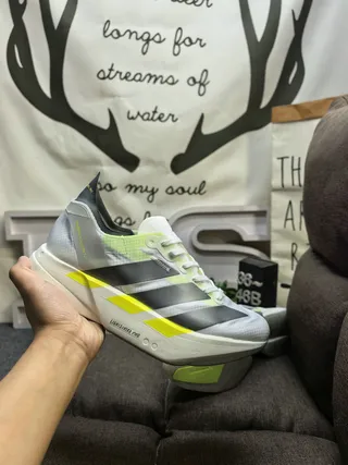 Adidas White Yellow Lightweight Mesh Upper Sculpted Lightstrike Pro Midsole Running Shoes