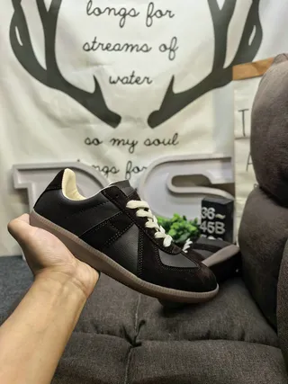 Maison Margiela Black Glossy Patent Leather Stitched Panel Construction Lifestyle Sneakers