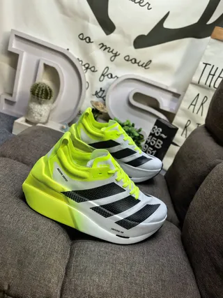 Adidas Yellow Black Asymmetrical Heel Cage Perforated Three-Stripe Design Running Shoes