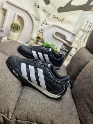 Adidas Black and White Three-Stripe Leather Low-Top Lifestyle Sneakers