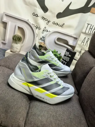 Adidas White Yellow Lightweight Mesh Upper Sculpted Lightstrike Pro Midsole Running Shoes