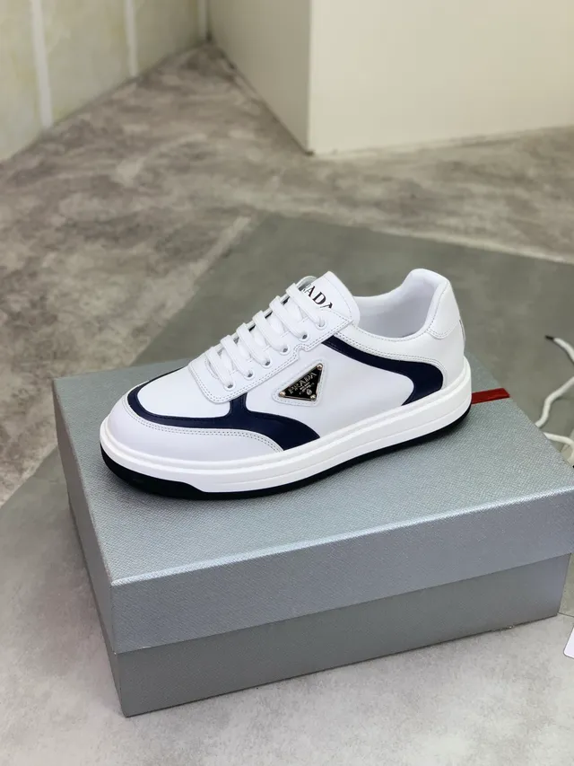 Prada White Navy Triangular Metal Logo Plaque Thick Layered Sole Lifestyle Sneakers