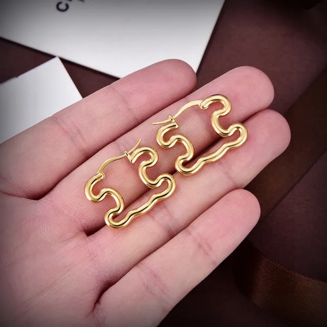 Celine Abstract Wavy Hoop Gold-Tone Earrings