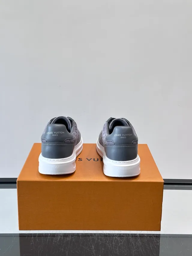 Louis Vuitton Gray White Monogrammed Canvas Upper Contrasting Dark Leather Overlays Lifestyle Sneakers