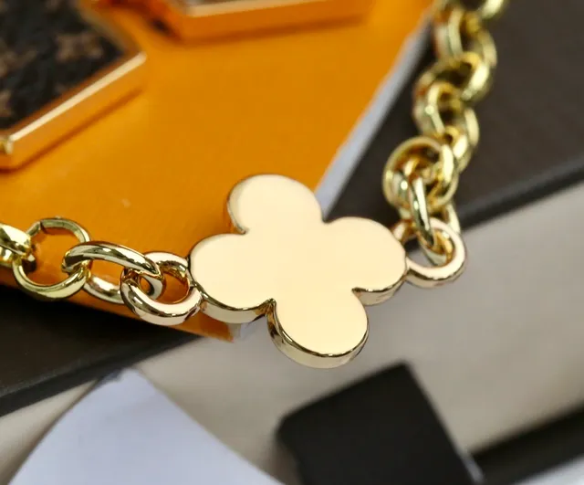 Louis Vuitton Monogram Flower and Vivienne Bear Gold Metal Engraved Phone Case