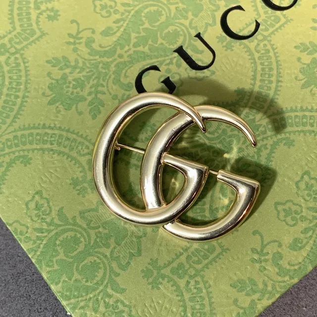 Gucci Double G Gold-Tone Interlocking Logo Brooch