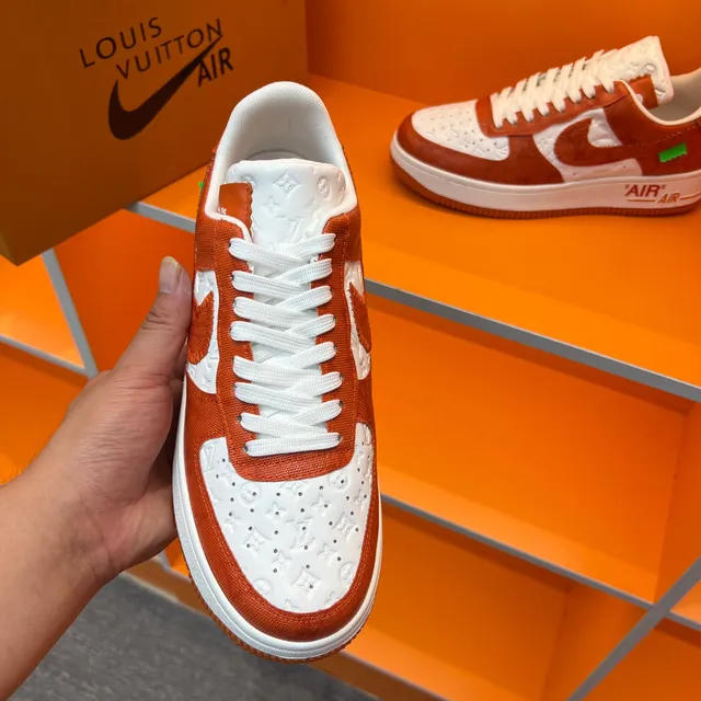 Nike Air Force 1 Orange and White Embossed Monogram Lifestyle Sneakers