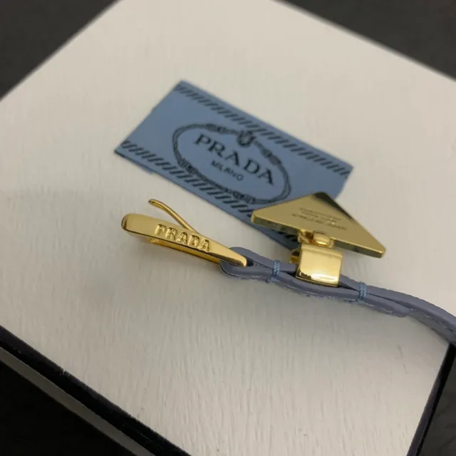 Prada Triangle Charm Blue Gold Thin Leather Strap Buckle Bracelet