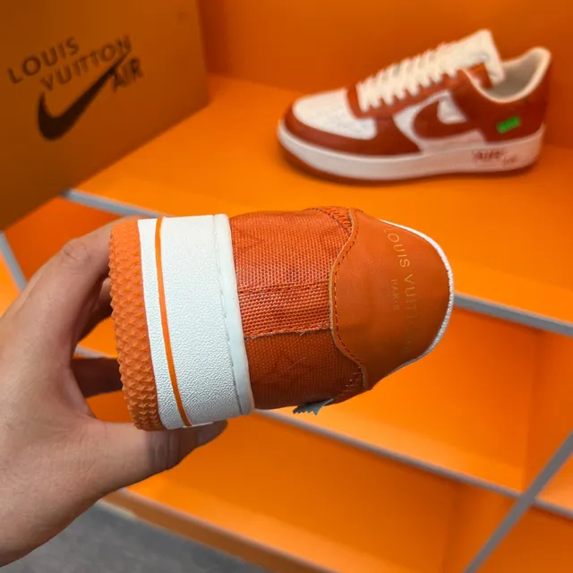 Nike Air Force 1 Orange and White Embossed Monogram Lifestyle Sneakers