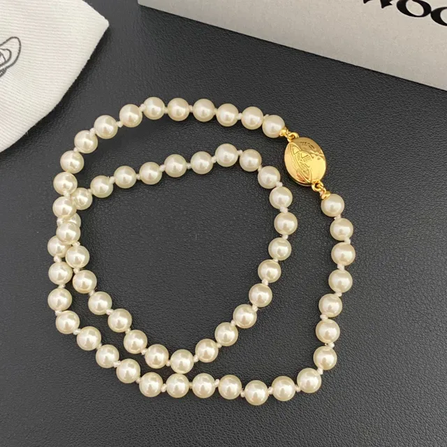 Vivienne Westwood Orb Pearl Necklace Beige Gold Strand Enamel Charm Necklace