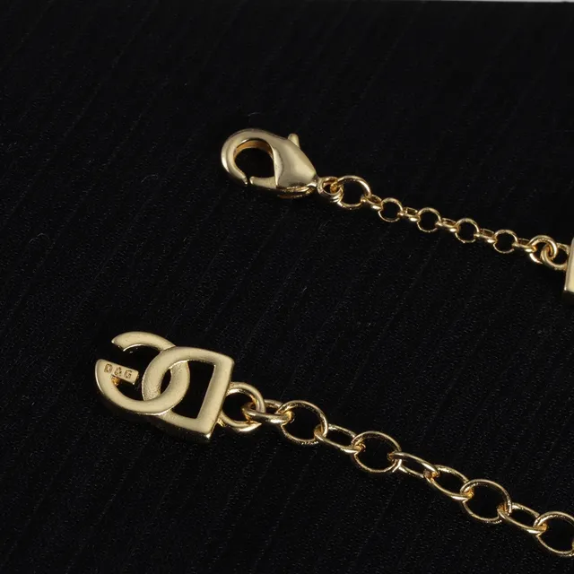 Lancôme Gold Chain Interlocking Logo Charms Bracelet