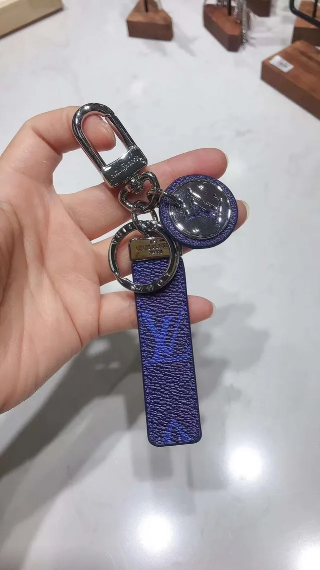 Louis Vuitton Blue White Monogrammed Leather Strap Circular Metallic Logo Charm Phone Case