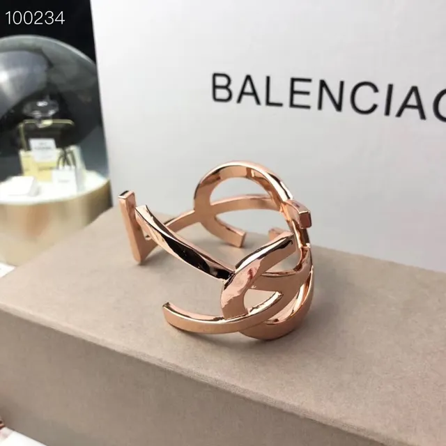 Balenciaga Le Cagole Gold and Rose Gold Interlocking Cuff Bracelets
