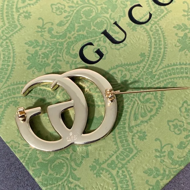 Gucci Double G Gold-Tone Interlocking Logo Brooch