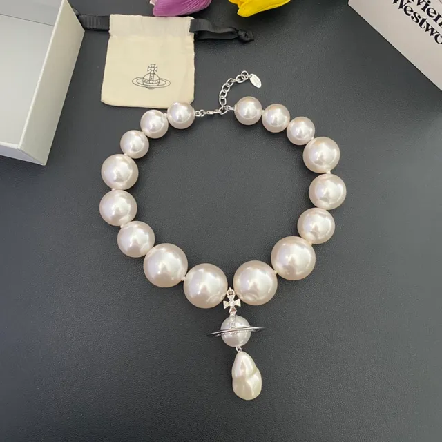 Vivienne Westwood Orb Necklace White Pearl Gold and Silver Tone Necklaces