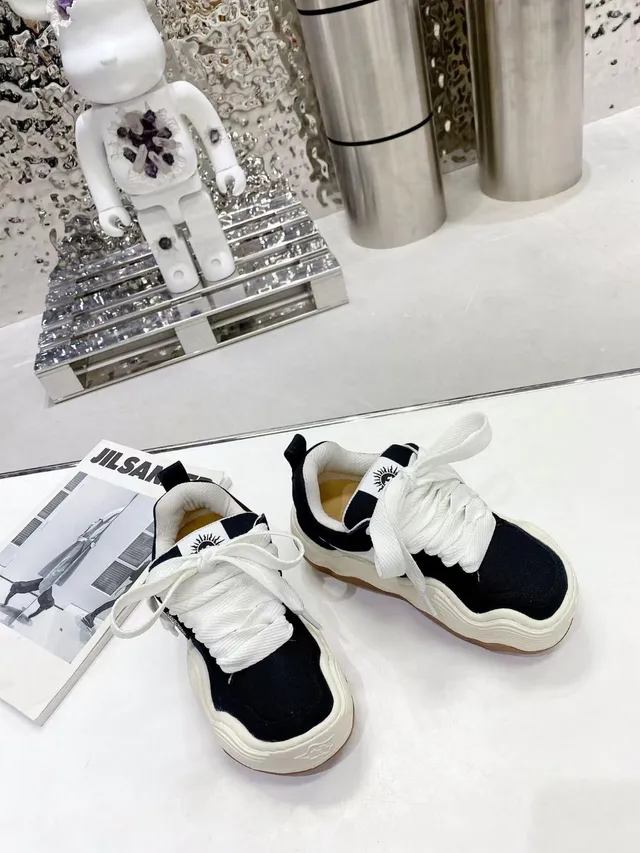 Jil Sander Black White Sculpted Wavy Midsole Canvas Upper Chunky Sneakers