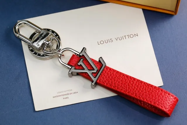 Louis Vuitton LV Monogram Keychain Black White Leather Strap Metal Charm Phone Case