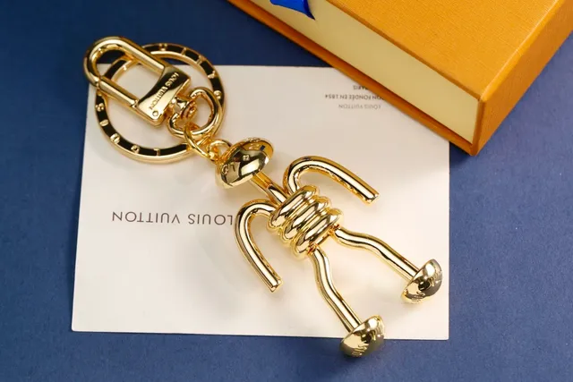 Louis Vuitton Silver Gold Articulated Stick-Figure Silhouette Coiled Torso Detail Crossbody Bag