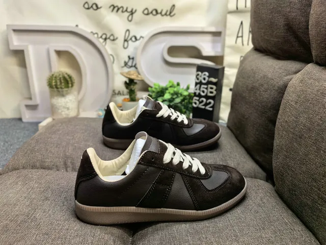 Maison Margiela Black Glossy Patent Leather Stitched Panel Construction Lifestyle Sneakers
