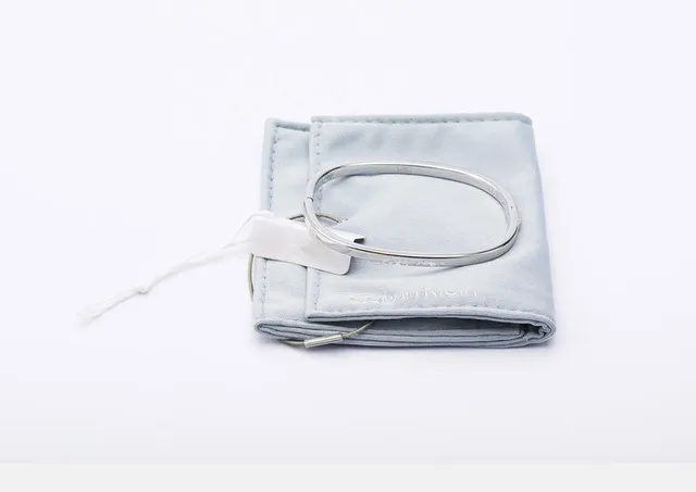 Calvin Klein Minimalist Engraved Silver-Tone Thin Bangle Bracelet