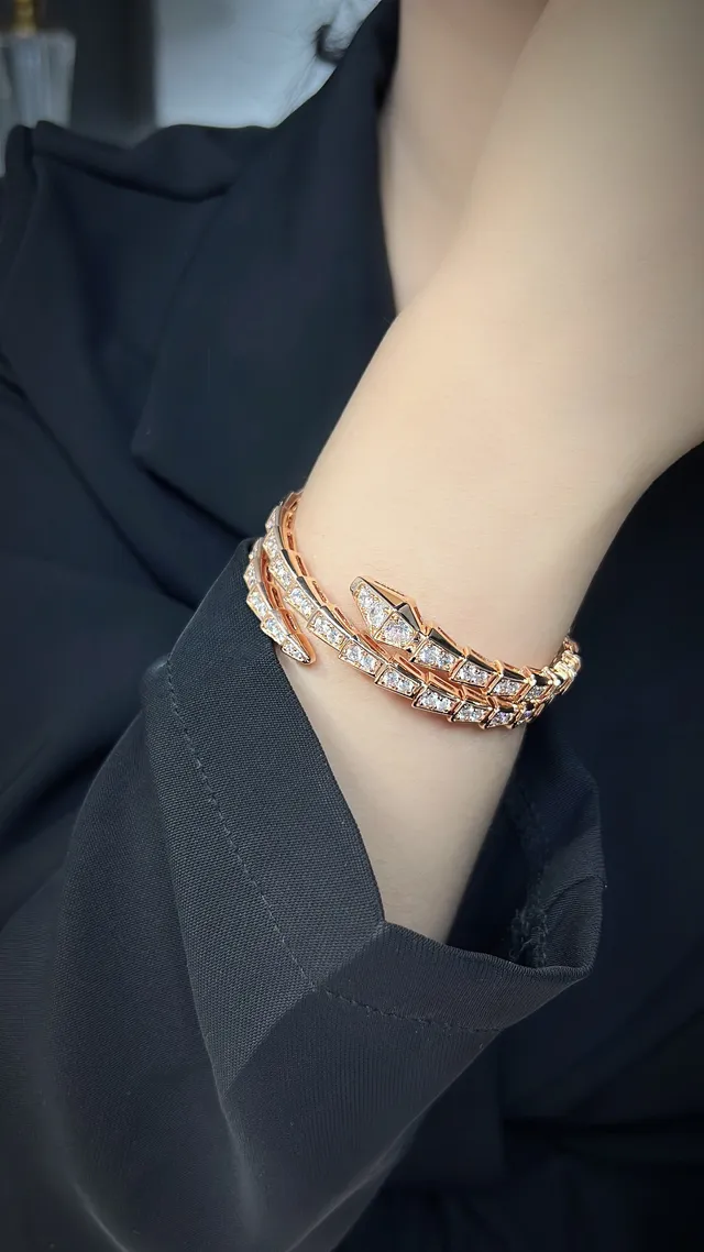 Bvlgari Gold Silver Coiled Serpentine Articulated Scale Motif Bracelet