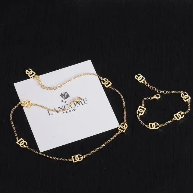 Lancôme Gold Chain Interlocking Logo Charms Bracelet