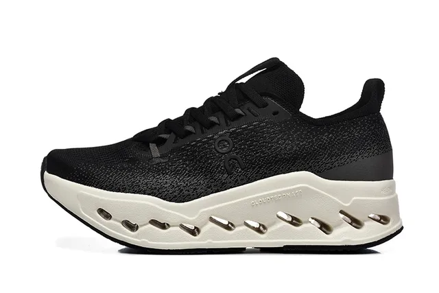 On Cloudmonster Black and Off-White Running Shoes