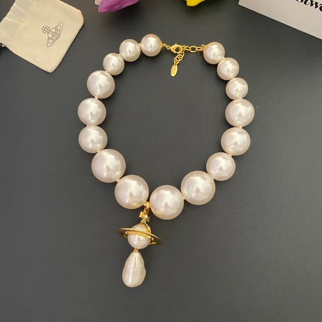 Vivienne Westwood Orb Necklace White Pearl Gold and Silver Tone Necklaces