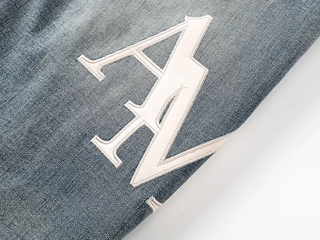 Amiri Blue White Distressed Graphic-Print Jeans