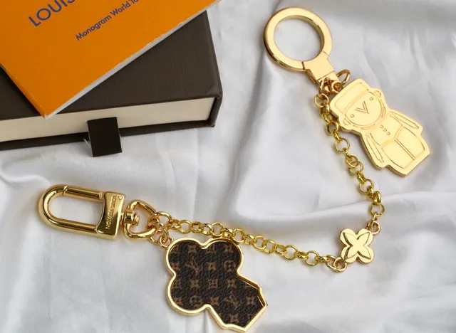 Louis Vuitton Monogram Flower and Vivienne Bear Gold Metal Engraved Phone Case