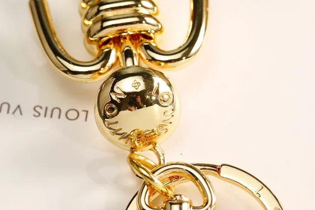 Louis Vuitton Silver Gold Articulated Stick-Figure Silhouette Coiled Torso Detail Crossbody Bag
