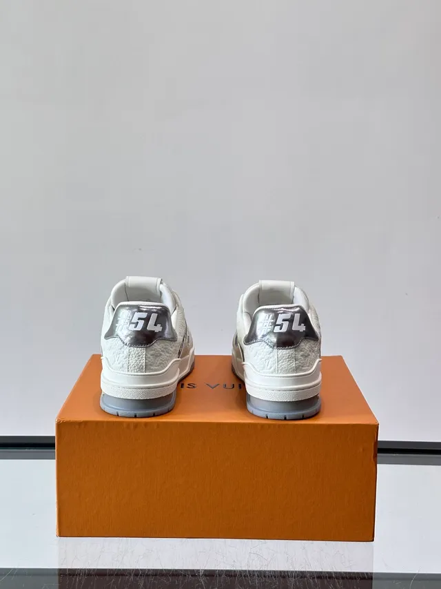Louis Vuitton LV Trainer White Silver Textured Pebbled Leather Metallic Heel Tab Lifestyle Sneakers