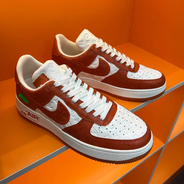 Nike Air Force 1 Orange and White Embossed Monogram Lifestyle Sneakers