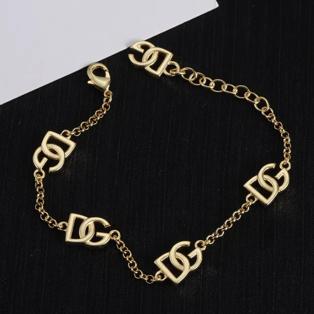 Lancôme Gold Chain Interlocking Logo Charms Bracelet