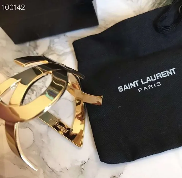 Balenciaga Le Cagole Gold and Rose Gold Interlocking Cuff Bracelets