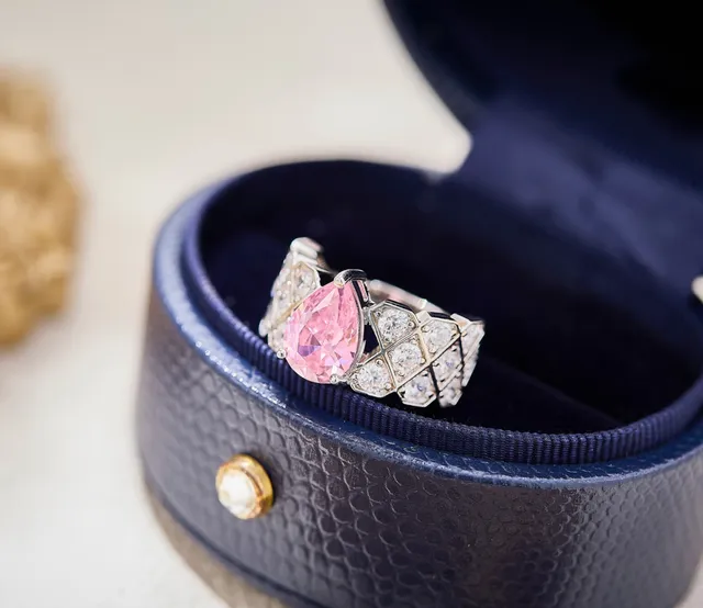 Pear-Cut Pink Gemstone and Diamond Lattice Ring